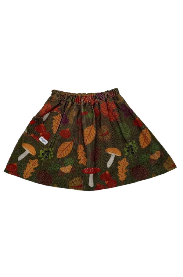 Brooke skirt 1; The front view of botanical print skirt. The print shown mushrooms, nuts, berries and autumn leaves printed on an organic cotton.